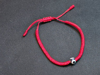 Hand Knotted Nepali Red Cord Evil Eye Bracelet