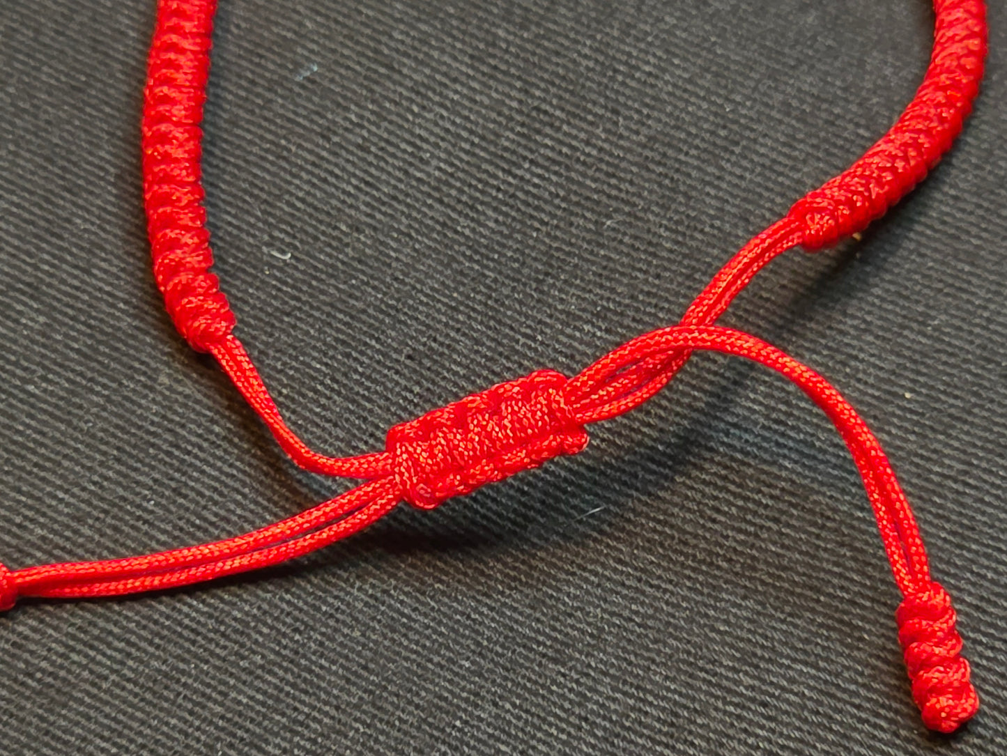 Hand Knotted Nepali Red Cord Evil Eye Bracelet