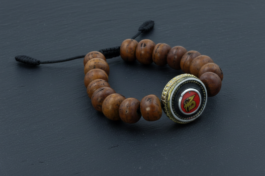 Antique Flat Bodhi Seed Wrist Mala Bracelet with Tibetan Om Inlaid Bead